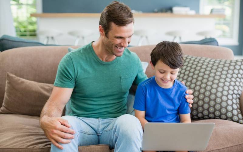 Dad Teaching His Son computer